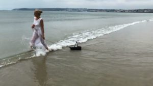 woman pulling a small boat