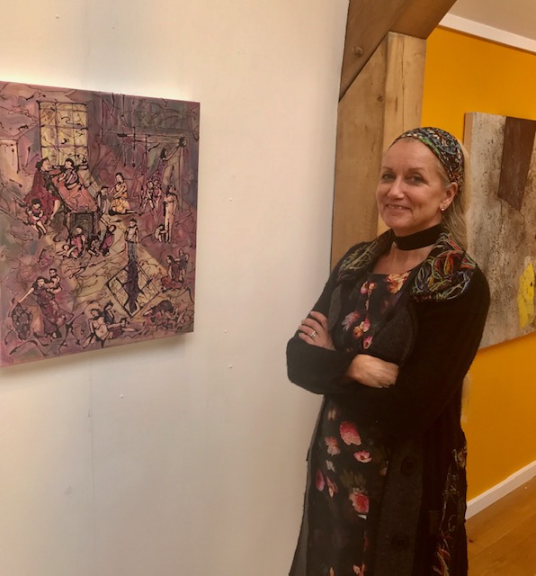 artist with her work