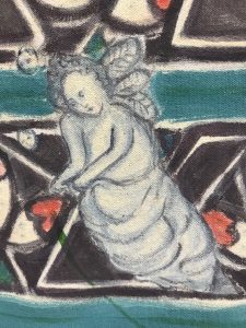 painted figure of a woman like angel