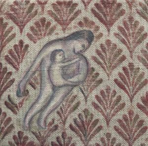 a small patterned painting with a figure holding a child