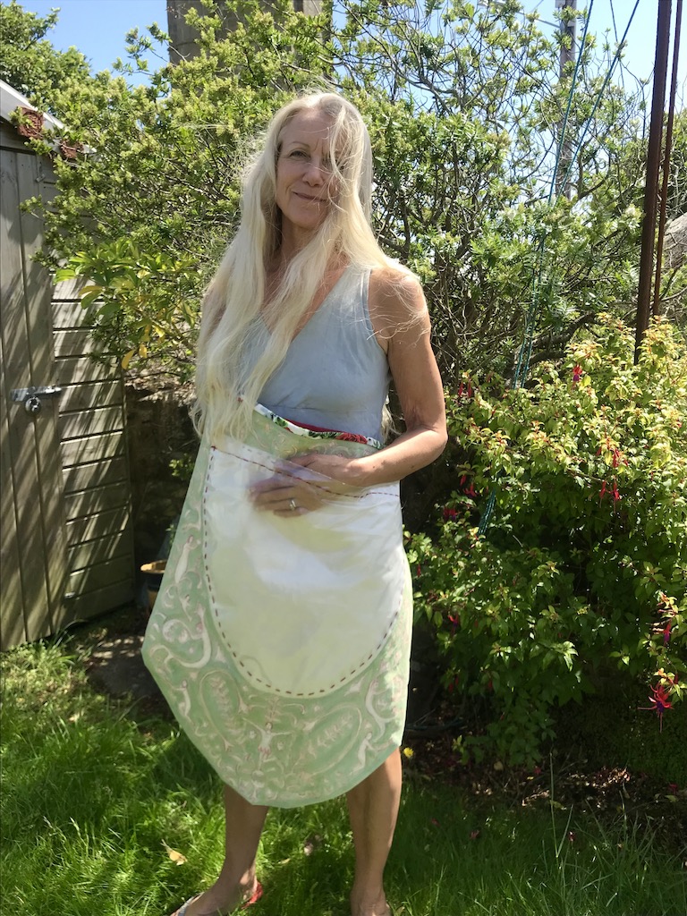 artist with performative bag