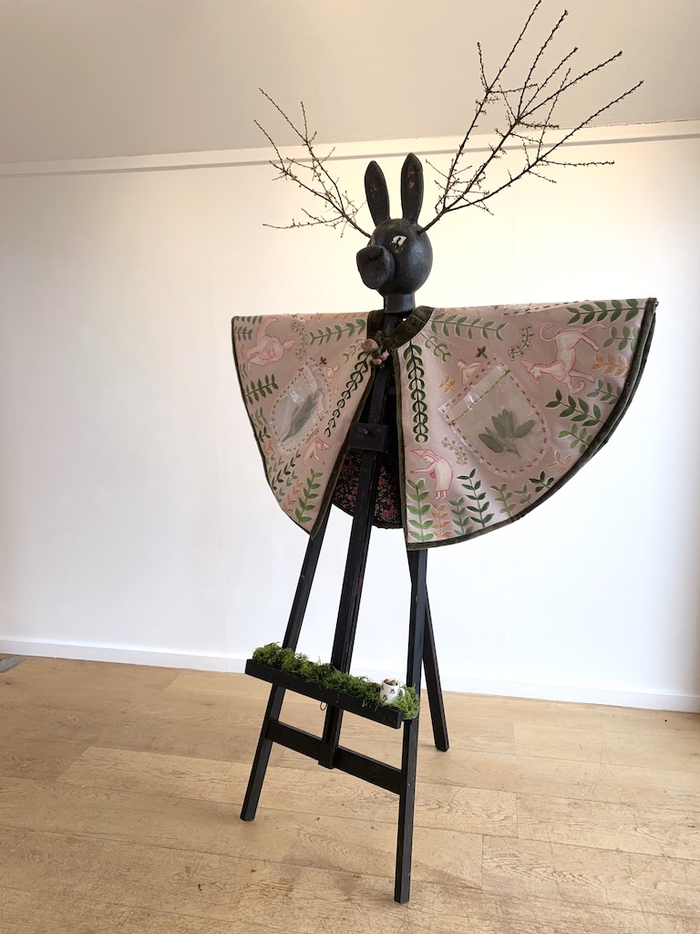 ecofeminist installation painting and found objects