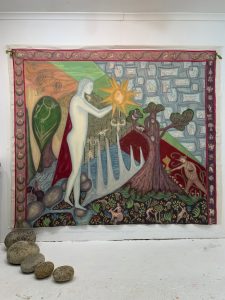 colourful tapestry-like painting with cornish eggs stones