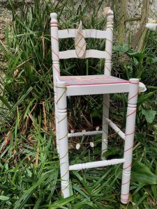 found object high chair and paint installation